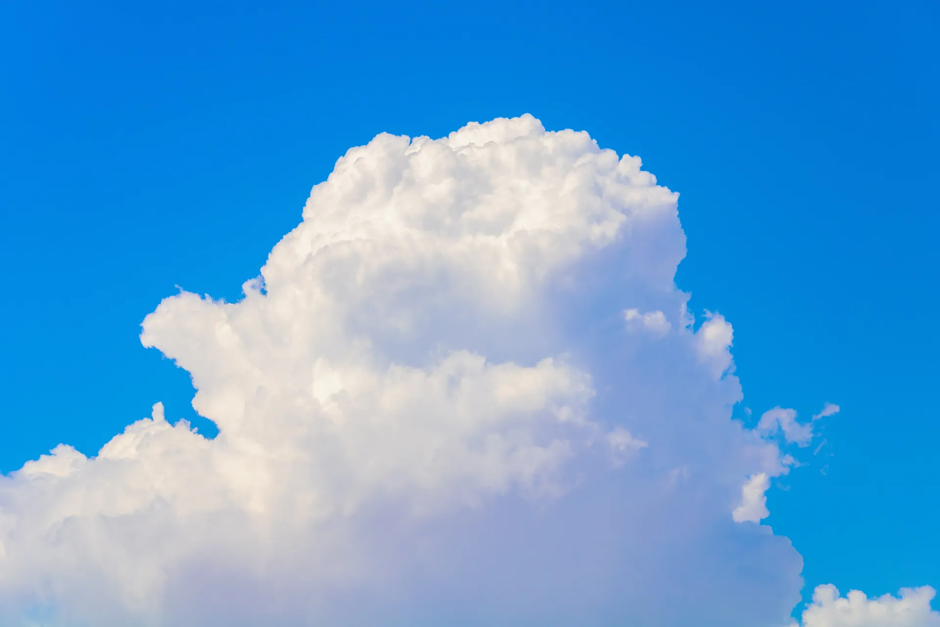 Oversaturated sky with big clouds.
